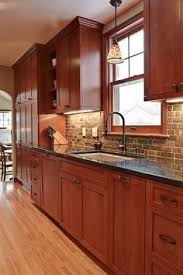 Kitchens with cherry wood cabinets offer a warm and luxurious look and match well with a variety of different countertop materials and finishes. 28 Best Natural Cherry Cabinets Ideas Cherry Cabinets Kitchen Remodel Kitchen Design