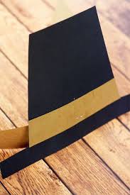 Fold a rectangular sheet of white paper like a strip. Kids Pilgrim Hat Diy For Thanksgiving Alpha Mom