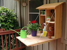 Use the keyhole saw to make the outlined holes for the speakers. How To Make A Fold Down Outdoor Cabinet Diy