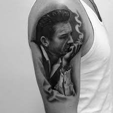 'johnny cash portrait' on his left arm. 50 Johnny Cash Tattoo Designs For Men Musician Ink Ideas