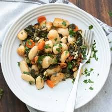 Put 2 cups water and the salt in a medium saucepan and add the beans. Baked Lima Bean Recipe Gigantes Plaki Veggies Don T Bite