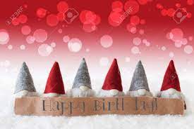 Happy Birthday Christmas Label With English Text Happy Birthday Christmas Greeting Card With Red Gnomes Bokeh And Christmassy Background With Snow Stock Photo Picture And Royalty Free Image Image 65145832