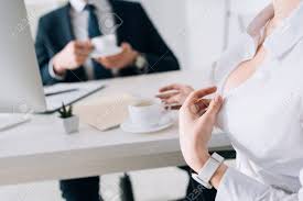 Cropped View Of Sexy Secretary With Big Breast Seducing Businessman In  Office Stock Photo, Picture and Royalty Free Image. Image 139654236.