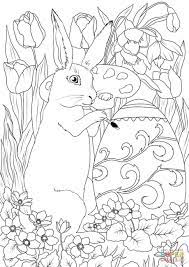 Easter Rabbit Is Decorating An Egg Super Coloring Easter Coloring Pages Bunny Coloring Pages Spring Coloring Pages