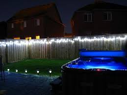 String the lights along your fence one idea to avoid nailing holes in the side of your house is to simply string the outdoor lights along your fence. Backyard Backyard Backyard Lighting Outdoor