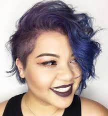 Braid the top section, make knots, cute buns, or simply pull it back into a pony. Curly Pixie Bob With Side Undercut Half Shaved Hair Shaved Side Hairstyles Shaved Hair Women