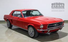 Innovative designs in garages now allow you to easily match your existing home. Buddy S Garage Harley Davidson American Classic Cars