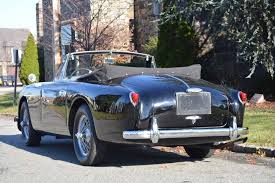 Image result for Pacific Blue 1957 Aston Martin