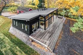 These Log Cabin Kit Homes From Finland Are Surprisingly Sleek Cabin Kit Homes Prefab Log Cabins Modern Prefab Homes