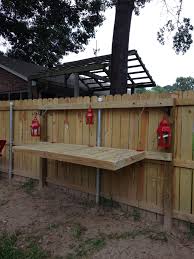 Fold Down Table Attached To Privacy Fence Build By My Husband Fold Down Table Building A Fence Small Outdoor Patios