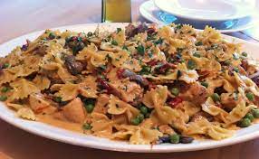 Add the remaining 3 tablespoons olive oil and steamed broccoli florets. Farfalle With Chicken And Roasted Garlic Cheesecake Factory Recipe For Affordable Fancy Dinner At Home Tourne Cooking Food Recipes Healthy Eating Ideas