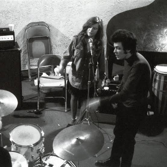 Rock N' Roll magic in the making! Pictured here is Janis Joplin and guitarist Mike Bloomfield who helped assemble the Kozmic Blues Band, Janis' final backing band, recording in the studio. Who