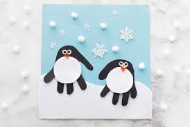 Two preschoolers actively playing on stony beach. 5 Kids Winter Craft Ideas