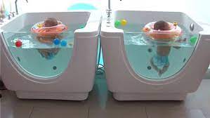 A Spa For Babies Watch These Triplets Enjoy Their Day Baby Spa Triplet Babies Baby Swimming