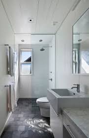 The open shelves below also add openness and provide plenty of storage space. Narrow Bathroom Layout Ideas