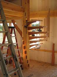 Hand built wooden spiral staircases. Spiral Stair In Timber Frame Cabin