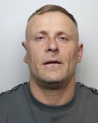 This is Dale Poppleton. The 41-year-old is wanted by police in West  Yorkshire for a "serious offence" and has links to northern England.  Officers say he is “very distinctive” due to the