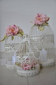 Hanging Bird Cage Decor Ideas The Christening Directory Vintage Elegance Birds Cages Flowers Hanging Bird Cage Vintage Birds Bird Cage