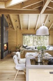 Living room windows by sierra pacific frame the outdoor dining room, with. Rustic Living Room Decor Ideas Inspired By Cozy Mountain Cabins