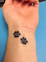 11 Funny Paw Tattoo Designs Pretty Designs Pawprint Tattoo Print Tattoos Tattoos