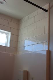 I like the new subway brick panels in swanstone solid surface but wonder if they will be hard to clean?? Tile Above Shower Enclosure Industrial Salt Lake City Houzz