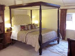 Inspired by victorian decadence, this elaborately carved four post canopy bed will make a stunning centerpiece to your traditional master bedroom. Wooden Super King Size Four Poster Bed W4p1 La65391 Loveantiques Com