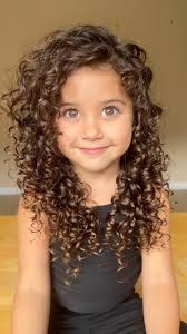 How to do a quick and easy messy bun #hairtutorial #curlyhair #reelsvideo