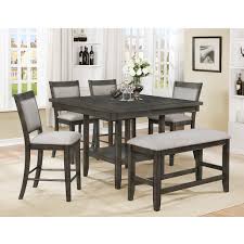 A wood top and solid metal legs make a statement without looking big and bulky. Fulton Grey Counter Height Dining Room Set