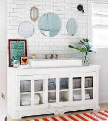 Love this feminine look for a diy bathroom vanity from 'domino'. 18 Creative Ideas For A Diy Bathroom Vanity With Images Diy Bathroom Vanity Bathrooms Remodel Bathroom Design