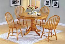 The round wooden dining table will bring a rustic finish to your home. 5pc Country Style Oak Finish Wood Round Dining Table And 4 Windsor Chair Set By Acme Fur Kitchen Table Settings Round Kitchen Table Set Round Dining Table Sets