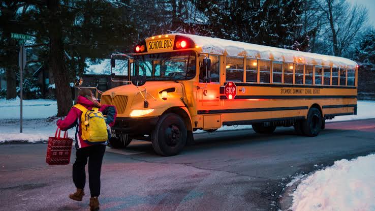 SCHOOL BUS AND A GIRL