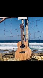 Playing Music With The Ocean Waves Sqoe Galleon Travelers Acoustic Guitar Sqoeguitarsphilippines Sqoeguitars Ocean Waves Waves Acoustic Guitar