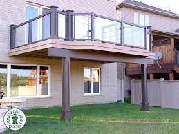This Sharp Second Level Deck Is Built In Kitchener Waterloo And Is Completely Low Maintenance Clubhouse Decking Deck Builders Local Builders Deck Views