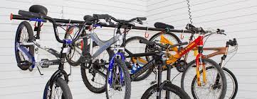 Ceiling mount hangers, garage ceiling, hang storage, bike and storage rack, bike lifts, explore bicycle lifts for garages. Proslat Powered Lifts In Edmonton Garage Storage