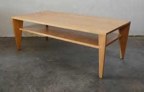 Features a professionally refinished, rectangular top, above a unique slatted lower level floating shelf adds additional space for storage, makers name (conant ball's furniture) stamped on the. Modernist Conant Ball Coffee Table