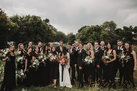 Black And Green Wedding This Wedding Party Wore All Black And Let The Florals Speak For Themselves Black Bridal Parties Wedding Party Outfits Bridal Parties Colors