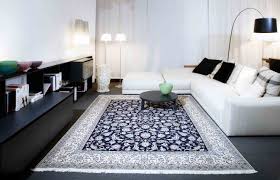 A Beautiful And Fine Knotted Nain Rug From The Manufacture Of Habibian In Combination With Mod Rugs In Living Room Persian Rug Living Room Living Room Carpet