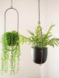 Well, there's a perfect indoor hanging planter all yours for the taking. Black Flower Pot Holder Metal Modern Plant Hanger Hanging Planter For Indoor Outdoor Home China Metal Iron Flower Planter And Pots And Planters For Plants Price Made In China Com