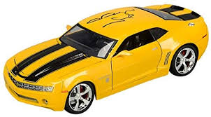 The character is a member of the autobots. Megan Fox Autographed Transformers Bumblebee 2006 Camaro 1 24 Scale Die Cast Car At Amazon S Entertainment Collectibles Store