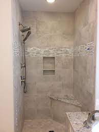 The granite tiles design is more common for the shower walls but recently the new trend came out. Renaissance Silver Tile And White Ice Granite Granite Bathroom Granite Shower White Ice Granite