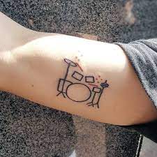 Skeleton playing the drums tattoo. Top 67 Drum Tattoo Ideas 2021 Inspiration Guide Small Tattoos For Guys Tattoos For Guys Drum Tattoo