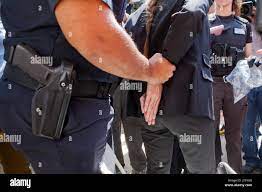 Police arrest woman hi-res stock photography and images - Alamy