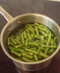 Wash the green beans you want to blanch and freeze under cold, running water, and snap off the stems and tips. How To Blanch Green Beans Bless This Mess