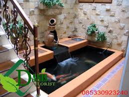 Kolam ikan minimalis ini berada di area taman. Tukang Kolam Koi Minimalis Banjarmasin Danis Florist Tukang Taman Wa 085330923240