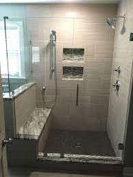 This Frameless Corner Shower Door Enclosure Features A Double Notched Glass Panel To Fit Over The Bench Seat Shower Doors Dream Bathroom Shower Shower Stall