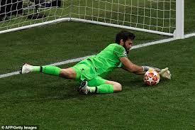 Alisson becker embraces a young supporter who had run on to the pitch during the international friendly game between liverpool and napoli at aviva. Alisson Becker Has Huge Hand In Champions League Glory Thanks To Calmness And Control Daily Mail Online