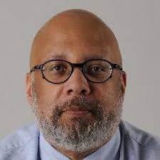 Sarasota native plays key role in newspaper's presentation of news.