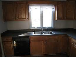 I recently gel stained my cabinets and while it did take 9 days total, it was a lot easier than painting and the results are so professional looking! Test Staining Oak Cabinets Espresso Brown Merrypad