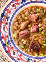 Pinto beans with ham hocks are a southern favorite, traditionally served with cornbread. Southern Pinto Beans With Ham Shanks Creole Contessa