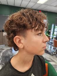 I'm sure this has been posted before too, but since we are 'Kingsdale Band'  mode here it is again!! Some marvellous haircuts in here!! (especially  mine)..